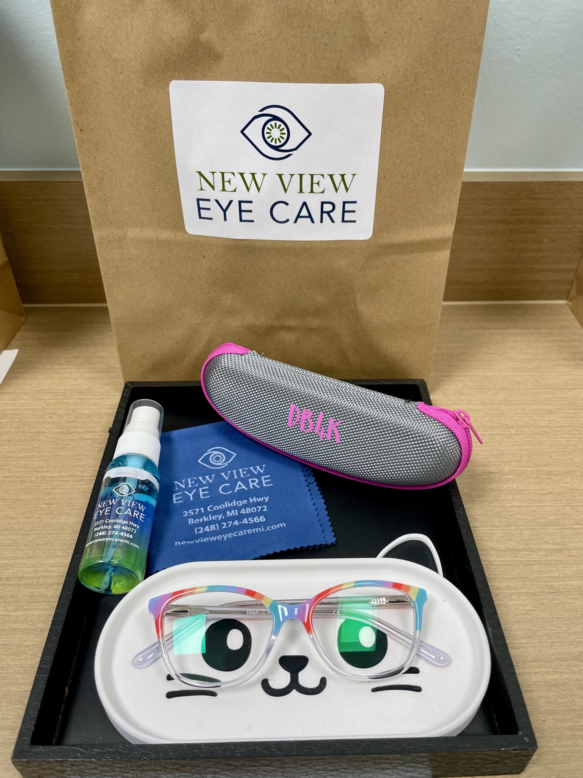 Pediatric Eye Exams 1 children's glasses on a free 3d printed holder